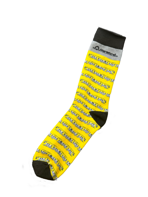 Yellow sock with Merseyrail 777 feature pattern on a white background