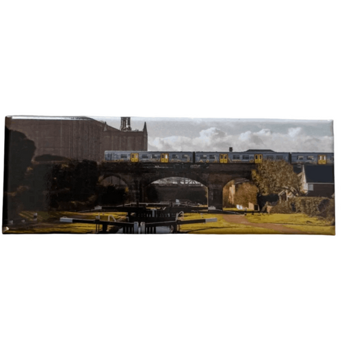 Merseyrail Magnet with a graphic of a train crossing a bridge at Stanley Dock.