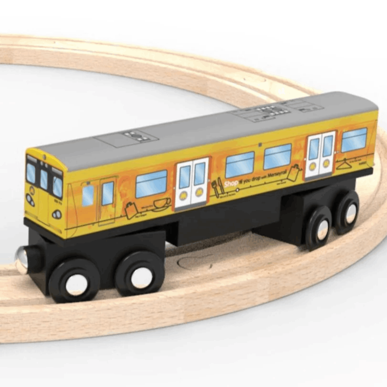 A wooden toy train car labeled 'Merseyrail' shown on a curved wooden track against a white background, with product text below reading 'Wooden Class 508 Toy Train'.