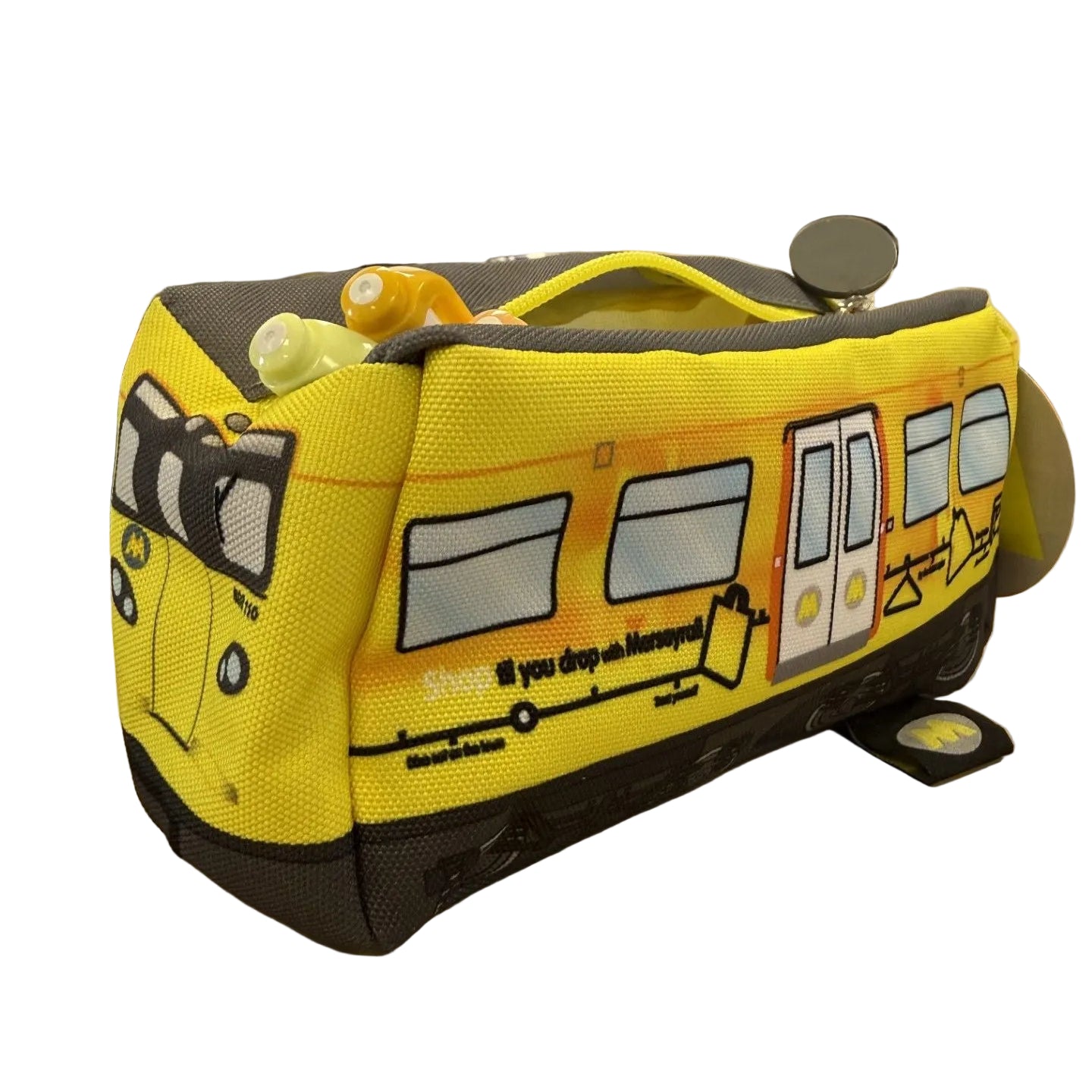 A yellow and grey pencil case designed to look like a cartoon Merseyrail train.